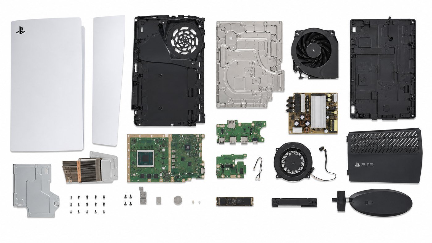 PlayStation 5 shown fully disassembled: side panels, chassis, heatsink, cooling fan, power supply and mainboard